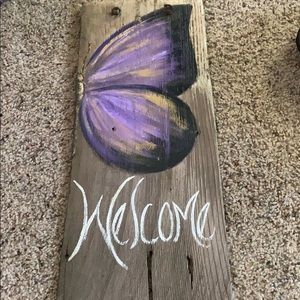Welcome sign made out of farm wood.